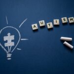 Scrabble Tiles and Chalk on Blue Background
