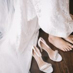 Woman Sitting Next Top Open Toe Sandasl
