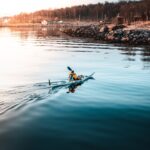 Person Riding on Kayak