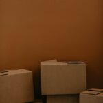 white cardboard box on brown wooden table