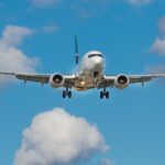 white airplane on mid air