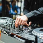DJ playing DJ controller