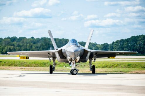 a fighter jet on the runway