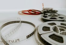 Torna SiciliAmbiente, il film festival internazionale con base a San Vito Lo Capo four reel films lying on white table