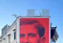 Don Pino Puglisi diventa un murales a Brancaccio, il dono della Fondazione Federico II