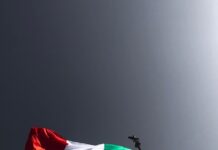 Campobello di Licata, polemiche su manifestazione antifascista:interviene Michele Termini low angle view of flag of Italy