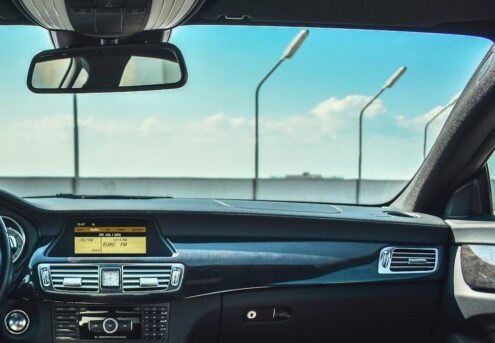 black Mercedes-Benz vehicle steering wheel